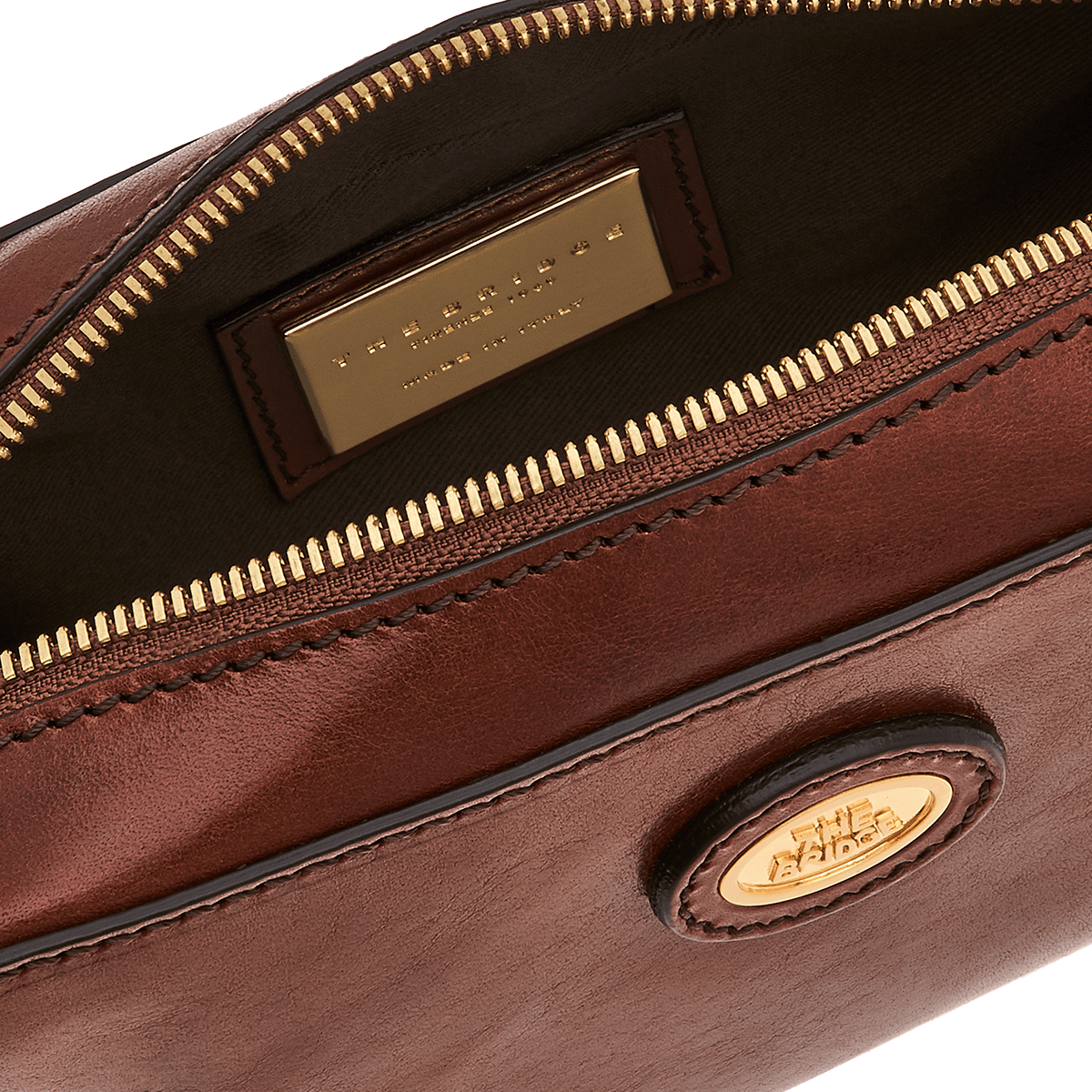 the-bridge-pochette-uomo-in-pelle-da-polso-marrone-oro image 2