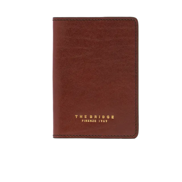 the-bridge-life-style-fw25-26-porta-passaporto-in-pelle-marrone-oro image 1